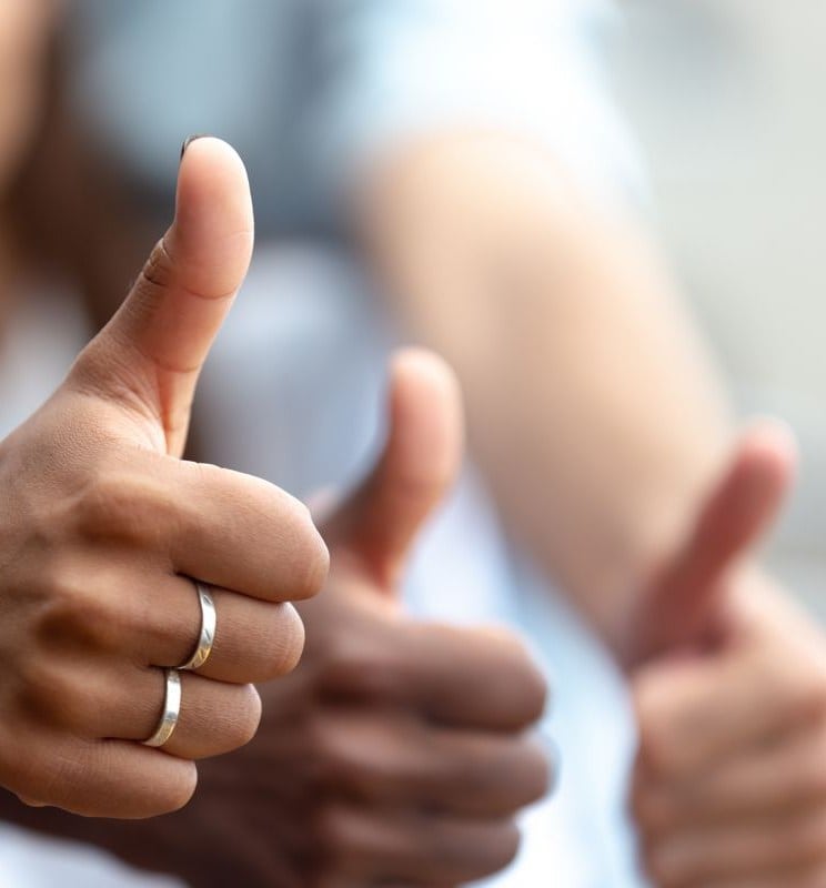 Close-up of a hand showing thumbs-up
